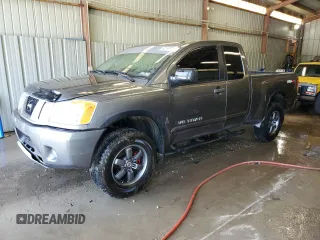 2014 Nissan Titan SV с VIN 1N6AA0CC1EN503180, выставлен на аукционе Copart как лот 62197715 с пробегом 103 827 миль миль и Списание • Salvage title. История ставок и продаж доступна на DreamBid. Изображение 1.
