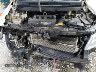 2015 Dodge Journey SE z VIN 3C4PDCABXFT595441, wystawiony jako Copart lot #59181825 z przebiegiem 122 263 mil mil oraz Szkoda całkowita • Salvage title. Historia ofert i sprzedaży dostępna na DreamBid. Obrazek 12.