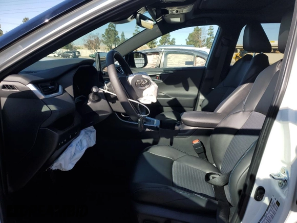 2024 Toyota RAV4 Hybrid XSE with VIN 2T3E6RFV4RW060903, listed as a Copart auction lot 49515785 with 8,637 mi miles and Salvage Title. Bid and sale history available at DreamBid. Image 7.