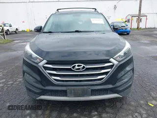 2017 Hyundai Tucson Value with VIN KM8J3CA28HU394750, listed as a IAAI auction lot 41960452 with 138,134 mi miles. Bid and sale history available at carsss.com. Image 12.