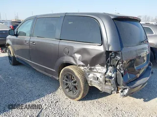 2019 Dodge Grand Caravan SE with VIN 2C4RDGBGXKR727315, listed as a IAAI auction lot 41770222 with 97,561 mi miles and . Bid and sale history available at DreamBid. Image 3.