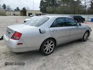 2003 Infiniti M45 with VIN JNKAY41E63M000613, listed as a Copart auction lot 41447045 with 310,520 mi miles and Salvage Title. Bid and sale history available at carsss.com. Image 3.