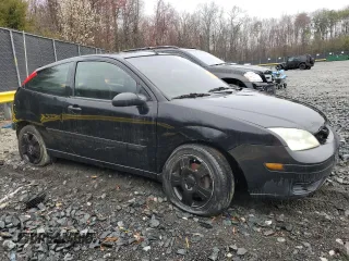 2005 Ford Focus with VIN 3FAHP31N65R146202, listed as a Copart auction lot 50226415 with 184,919 mi miles and Salvage title. Bid and sale history available at DreamBid. Image 4.