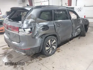 2024 Volkswagen Atlas SE with VIN 1V2KR2CA4RC559169, listed as a IAAI auction lot 41572821 with 25,998 mi miles and . Bid and sale history available at DreamBid. Image 4.