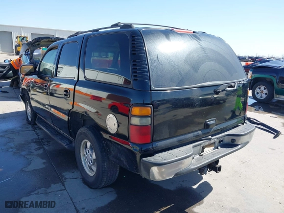 2002 Chevrolet Tahoe LT with VIN 1GNEC13Z32R299695, listed as a IAAI auction lot 41721527 with 230,544 mi miles. Bid and sale history available at carsss.com. Image 3.