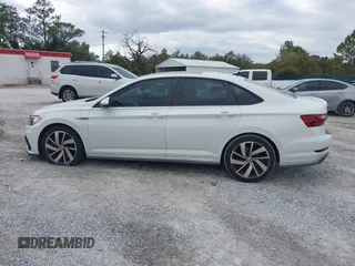 2020 Volkswagen Jetta GLI S with VIN 3VW6T7BU8LM058477, listed as a IAAI auction lot 41504769 with 121,419 mi miles and . Bid and sale history available at DreamBid. Image 14.