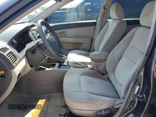 2006 Kia Spectra EX z VIN KNAFE121965370962, wystawiony jako Copart lot #57651215 z przebiegiem 152 308 mil mil oraz Szkody całkowita. Historia ofert i sprzedaży dostępna na DreamBid. Obrazek 7.