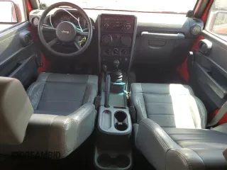 2007 Jeep Wrangler X with VIN 1J4FA241X7L111017, listed as a Copart auction lot 58871815 with 118,566 mi miles and Salvage title. Bid and sale history available at DreamBid. Image 8.