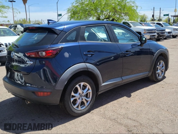 2020 Mazda CX-3 Sport with VIN JM1DKDB76L1465863, listed as a IAAI auction lot 42137563 with 180,000 mi miles. Bid and sale history available at carsss.com. Image 4.