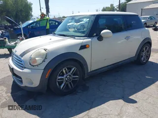 2011 MINI Hardtop with VIN WMWSU3C53BTX97140, listed as a IAAI auction lot 41861648 with 111,899 mi miles and . Bid and sale history available at DreamBid. Image 2.
