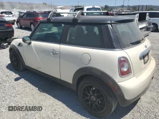 2013 MINI Hardtop with VIN WMWSU3C51DT682510, listed as a Copart auction lot 63879335 with 227,748 mi miles and Clean title. Bid and sale history available at DreamBid. Image 2.
