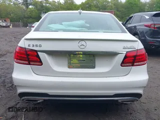 2014 Mercedes-Benz E 350 Luxury with VIN WDDHF8JB8EA980004, listed as a IAAI auction lot 42160745 with 58,418 mi miles and . Bid and sale history available at DreamBid. Image 17.