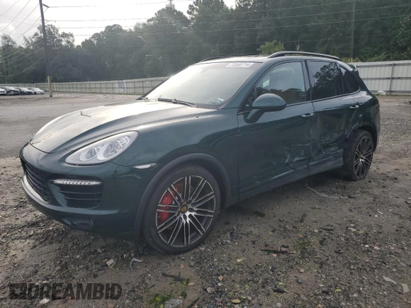 2012 Porsche Cayenne Turbo with VIN WP1AC2A25CLA80579, listed as a Copart auction lot 73360714 with 88,302 mi miles and Salvage title. Bid and sale history available at DreamBid. Image 1.