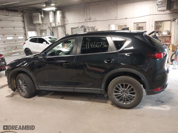 2019 Mazda CX-5 Touring with VIN JM3KFACM7K1568732, listed as a IAAI auction lot 41866736 with 50,753 mi miles. Bid and sale history available at carsss.com. Image 14.