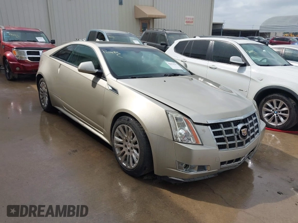 2013 Cadillac CTS Coupe Premium with VIN 1G6DS1E36D0107566, listed as a IAAI auction lot 42079197 with 122,386 mi miles. Bid and sale history available at carsss.com. Image 1.