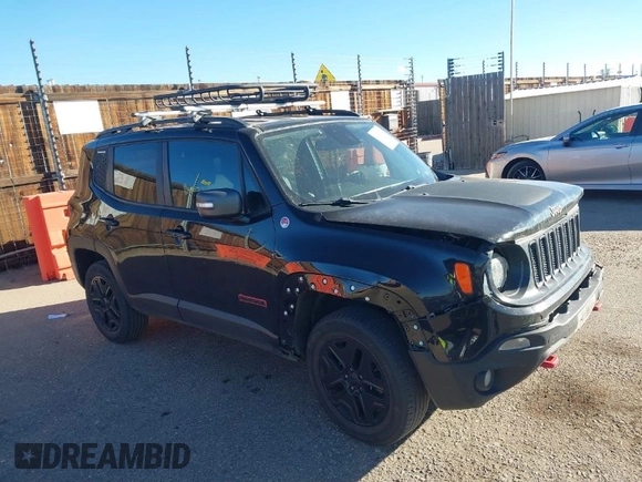 2018 Jeep Renegade Trailhawk with VIN ZACCJBCB4JPJ00887, listed as a IAAI auction lot 40981104 with 99,983 mi miles. Bid and sale history available at carsss.com. Image 1.