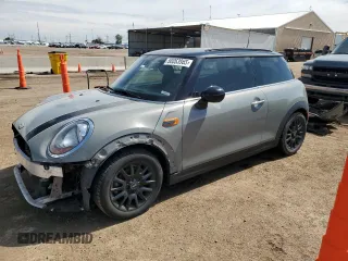 2015 MINI Hardtop with VIN WMWXM5C5XFT974077, listed as a Copart auction lot 58063965 with 93,853 mi miles and Salvage title. Bid and sale history available at DreamBid. Image 1.