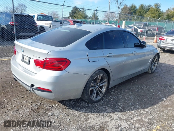 2018 BMW 4 Series 430i with VIN WBA4J1C56JBG80262, listed as a IAAI auction lot 41451833 with 148,487 mi miles and . Bid and sale history available at carsss.com. Image 4.