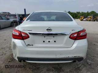 2016 Nissan Altima SV with VIN 1N4AL3AP0GC267131, listed as a Copart auction lot 53040465 with 122,308 mi miles and Salvage Title. Bid and sale history available at carsss.com. Image 6.
