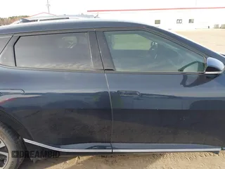 2023 Kia EV6 Wind z VIN KNDC34LA9P5127293, wystawiony jako IAAI lot #41711613 z przebiegiem 12 365 mil mil oraz . Historia ofert i sprzedaży dostępna na DreamBid. Obrazek 14.