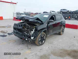 2018 Jeep Compass Trailhawk with VIN 3C4NJDDB6JT442016, listed as a IAAI auction lot 41068443 with 114,579 mi miles and . Bid and sale history available at carsss.com. Image 2.