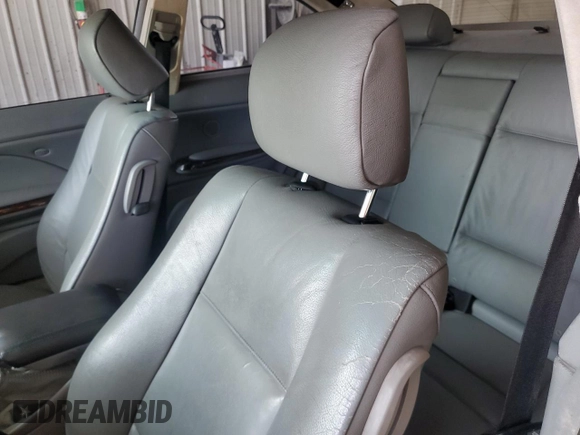 2005 BMW 3 Series 325Ci with VIN WBABD33425JY99519, listed as a Copart auction lot 71006334 with 177,455 mi miles and Salvage Title. Bid and sale history available at carsss.com. Image 10.
