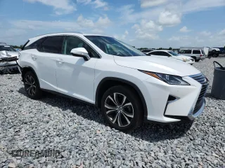 2018 Lexus RX 350L Premium с VIN JTJDZKCA2J2007817, выставлен на аукционе Copart как лот 61069725 с пробегом 74 461 миль миль и Списание • Salvage title. История ставок и продаж доступна на DreamBid. Изображение 4.