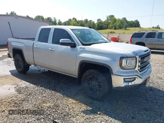2016 GMC Sierra 1500 SLE z VIN 1GTV2MEC7GZ283271, wystawiony jako IAAI lot #40133147 z przebiegiem 205 464 mil mil oraz . Historia ofert i sprzedaży dostępna na DreamBid. Obrazek 1.