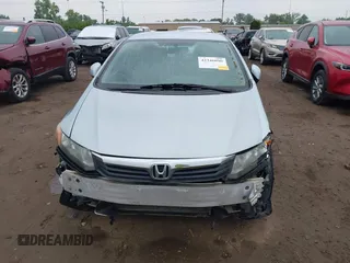 2012 Honda Civic LX z VIN 19XFB2F54CE018953, wystawiony jako IAAI lot #42346090 z przebiegiem 156 370 mil mil oraz . Historia ofert i sprzedaży dostępna na DreamBid. Obrazek 12.