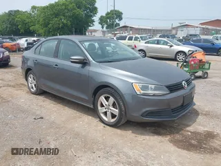 2012 Volkswagen Jetta TDI w/Premium & Nav z VIN 3VWLL7AJ7CM120526, wystawiony jako IAAI lot #42494136 z przebiegiem 149 202 mil mil oraz . Historia ofert i sprzedaży dostępna na DreamBid. Obrazek 1.