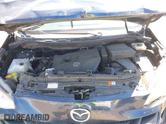 2014 Mazda 5 Sport with VIN JM1CW2BLXE0175975, listed as a IAAI auction lot 40278614 with 102,430 mi miles and . Bid and sale history available at DreamBid. Image 10.