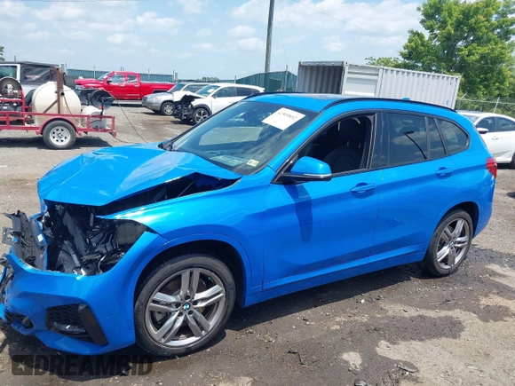 2021 BMW X1 xDrive28i with VIN WBXJG9C04M5T61811, listed as a IAAI auction lot 42509852 with 30,400 mi miles and . Bid and sale history available at DreamBid. Image 14.