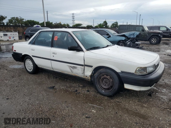 1991 Toyota Camry z VIN JT2SV21E2M3435406, wystawiony jako Copart lot #74958494 z przebiegiem 127 580 mil mil oraz Szkoda całkowita • Salvage title. Historia ofert i sprzedaży dostępna na DreamBid. Obrazek 4.