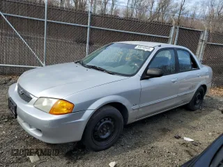 2000 Mazda Protege DX with VIN JM1BJ222XY0199683, listed as a Copart auction lot 50010565 with 139,428 mi miles and Salvage Title. Bid and sale history available at DreamBid. Image 1.