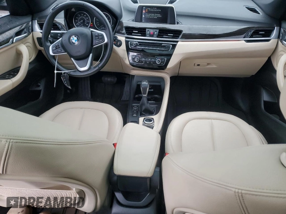 2017 BMW X1 xDrive28i with VIN WBXHT3C3XH5F69573, listed as a Copart auction lot 52719715 with 93,981 mi miles and Salvage Title. Bid and sale history available at DreamBid. Image 8.