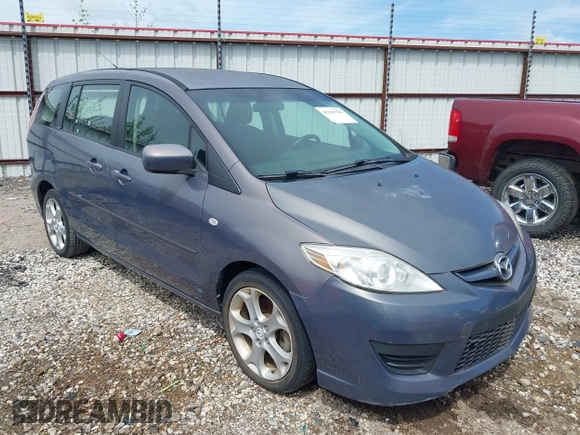 2009 Mazda 5 Touring with VIN JM1CR29LX90333914, listed as a IAAI auction lot 42101304 with 129,470 mi miles. Bid and sale history available at carsss.com. Image 1.