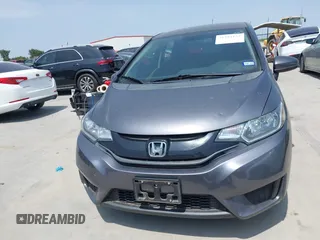 2015 Honda Fit LX with VIN 3HGGK5H55FM724750, listed as a IAAI auction lot 42282137 with 32,696 mi miles and . Bid and sale history available at DreamBid. Image 12.