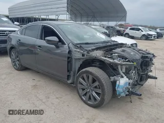2020 Mazda 6 Touring with VIN JM1GL1VM5L1511578, listed as a IAAI auction lot 41704099 with 34,540 mi miles. Bid and sale history available at carsss.com. Image 1.
