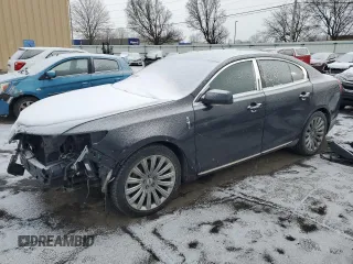 2014 Lincoln MKS with VIN 1LNHL9EK0EG602349, listed as a Copart auction lot 45211525 with 51,616 mi miles and Salvage Title. Bid and sale history available at carsss.com. Image 1.