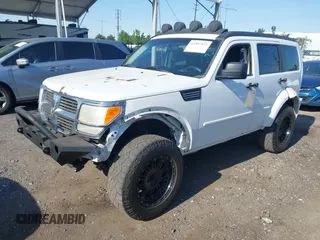 2011 Dodge Nitro Heat with VIN 1D4PT4GK9BW596989, listed as a IAAI auction lot 42397427 with 158,609 mi miles and . Bid and sale history available at DreamBid. Image 17.