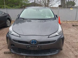 2021 Toyota Prius L Eco with VIN JTDKAMFU6M3140081, listed as a IAAI auction lot 42131187 with 103,973 mi miles and . Bid and sale history available at DreamBid. Image 12.