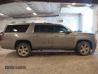 2019 Chevrolet Suburban Premier with VIN 1GNSKJKC1KR291629, listed as a IAAI auction lot 41565675 with 129,672 mi miles and . Bid and sale history available at DreamBid. Image 13.