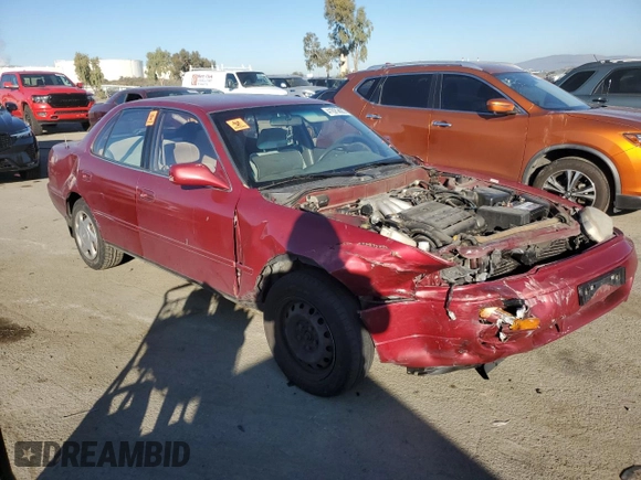 1995 Toyota Camry LE with VIN JT2GK12E5S0096419, listed as a Copart auction lot 41929695 with 153,131 mi miles and Salvage Title. Bid and sale history available at carsss.com. Image 4.