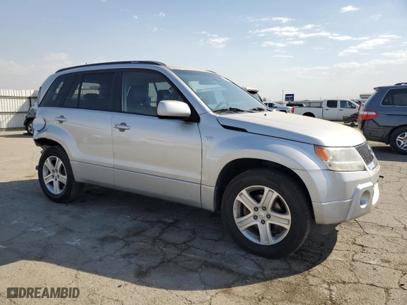 2006 Suzuki Grand Vitara Luxury with VIN JS3TD947X64105371, listed as a Copart auction lot 74854714 with 105,797 mi miles and Salvage Title. Bid and sale history available at carsss.com. Image 4.