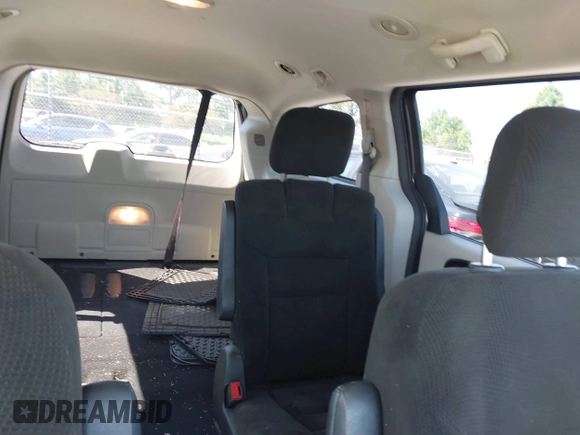 2015 Dodge Grand Caravan SXT with VIN 2C4RDGCG4FR631362, listed as a IAAI auction lot 42027066 with 149,599 mi miles and . Bid and sale history available at DreamBid. Image 8.