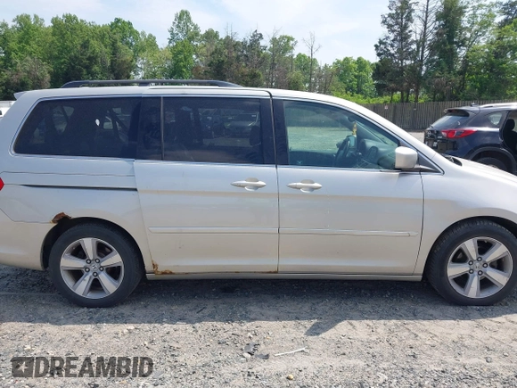 2006 Honda Odyssey Touring z VIN 5FNRL38816B012601, wystawiony jako IAAI lot #42148571 z przebiegiem 278 590 mil mil oraz . Historia ofert i sprzedaży dostępna na DreamBid. Obrazek 13.