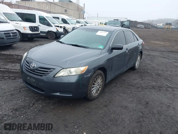 2009 Toyota Camry LE z VIN 4T1BK46K49U093612, wystawiony jako IAAI lot #41847395 z przebiegiem 250 383 mil mil oraz . Historia ofert i sprzedaży dostępna na DreamBid. Obrazek 2.