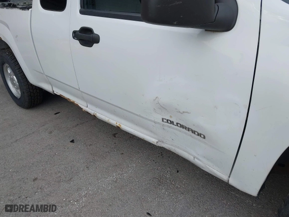 2005 Chevrolet Colorado LS ZQ8 with VIN 1GCCS196558110152, listed as a IAAI auction lot 42058390 with 264,742 mi miles. Bid and sale history available at carsss.com. Image 6.