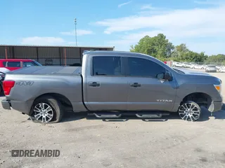 2023 Nissan Titan SV with VIN 1N6AA1EC6PN101712, listed as a IAAI auction lot 40206621 with 50,210 mi miles and . Bid and sale history available at DreamBid. Image 13.