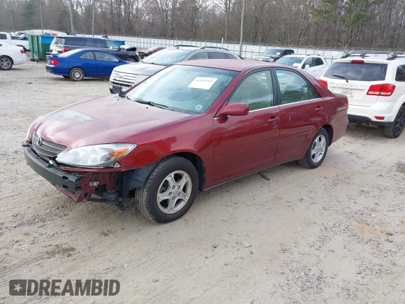 2002 Toyota Camry LE z VIN 4T1BE32K82U005531, wystawiony jako IAAI lot #41650283 z przebiegiem 328 259 mil mil oraz . Historia ofert i sprzedaży dostępna na DreamBid. Obrazek 18.